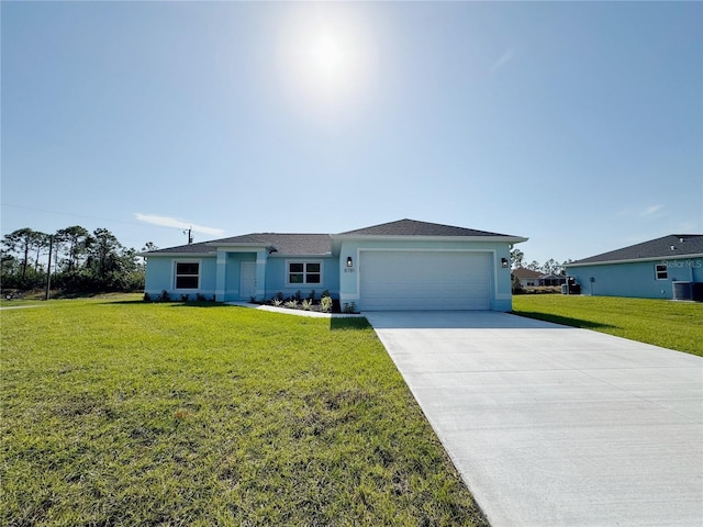 ranch-style house featuring a garage and a front yard