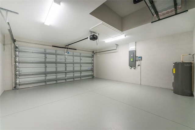 garage featuring a garage door opener, electric panel, and water heater