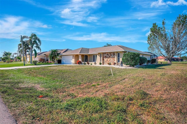 ranch-style home with a front lawn and a garage