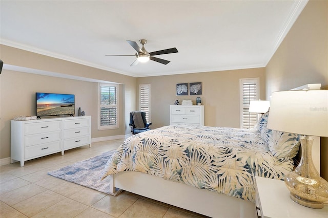 bedroom with ceiling fan, crown molding, and multiple windows