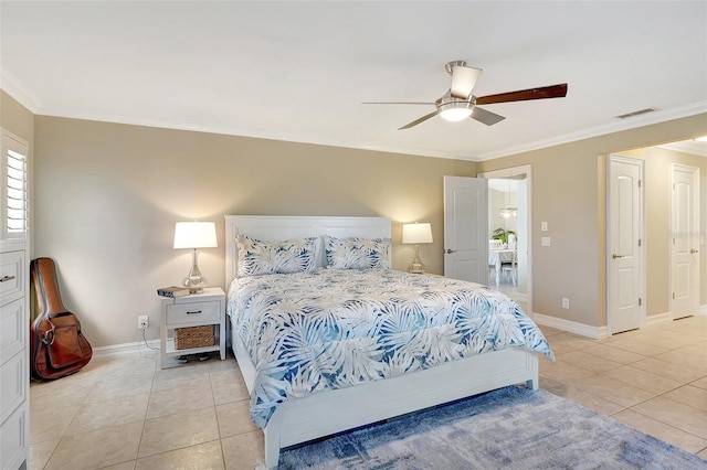 bedroom with ceiling fan, light tile patterned flooring, and crown molding