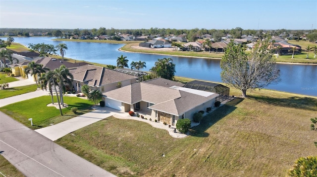 drone / aerial view with a water view