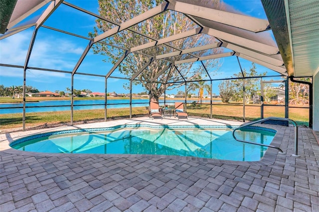 view of swimming pool featuring a water view, a lanai, and a patio area