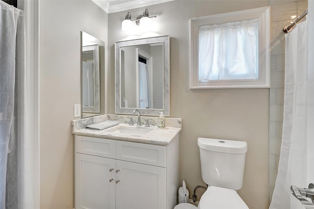 bathroom featuring vanity, walk in shower, and toilet