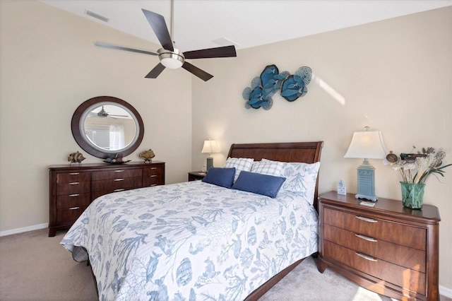 bedroom featuring ceiling fan and light colored carpet