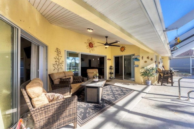 view of patio featuring ceiling fan and an outdoor hangout area