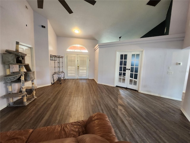 entrance foyer featuring ceiling fan, french doors, and dark hardwood / wood-style floors