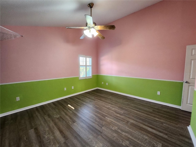 spare room with dark hardwood / wood-style floors and ceiling fan