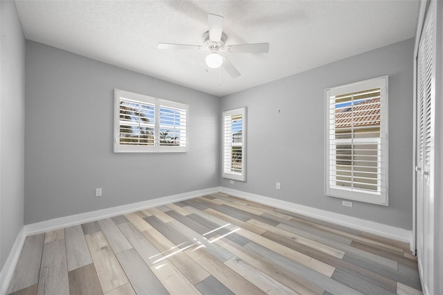525 Madrid Blvd, Punta Gorda, FL 33950 - empty room featuring light wood-style floors and a ceiling fan