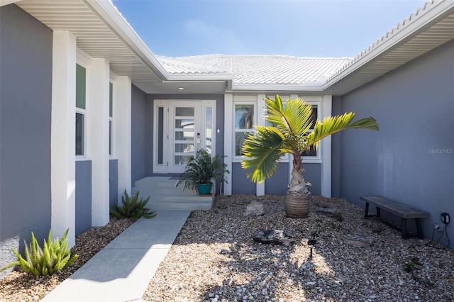 525 Madrid Blvd, Punta Gorda, FL 33950 - entrance to property with stucco siding and a tile roof