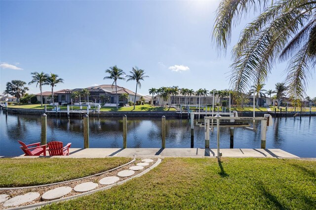 525 Madrid Blvd, Punta Gorda, FL 33950 - dock area featuring boat lift, a residential view, and a water view