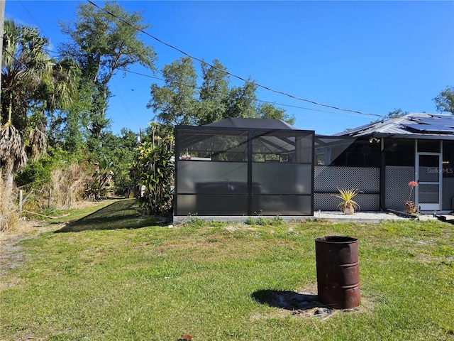 view of yard with a lanai