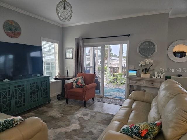 living room with ornamental molding