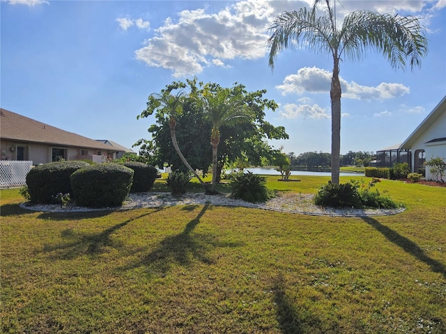 view of yard with a water view