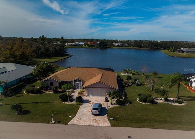 birds eye view of property featuring a water view