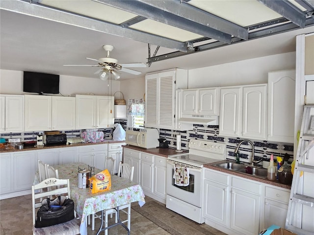 kitchen featuring white appliances, exhaust hood, white cabinets, sink, and ceiling fan