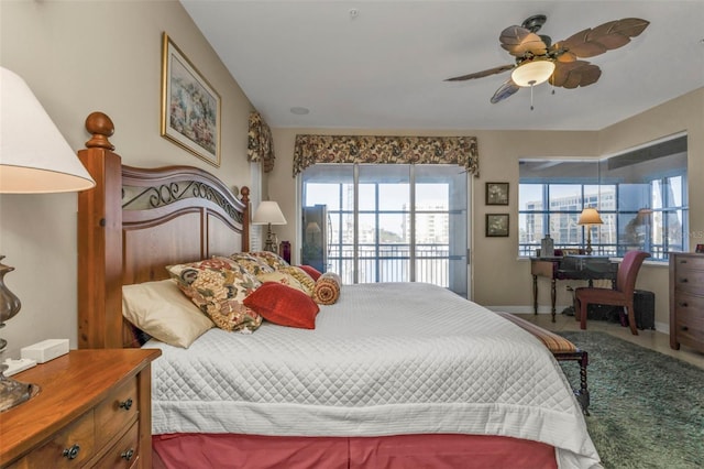 bedroom featuring access to exterior and ceiling fan