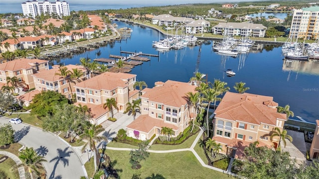 drone / aerial view with a water view