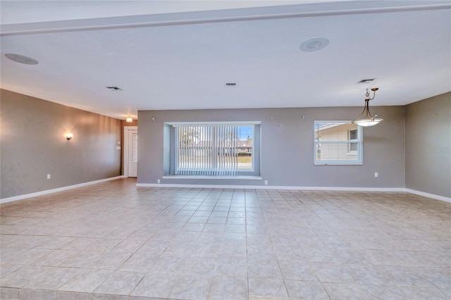 unfurnished living room with light tile patterned floors