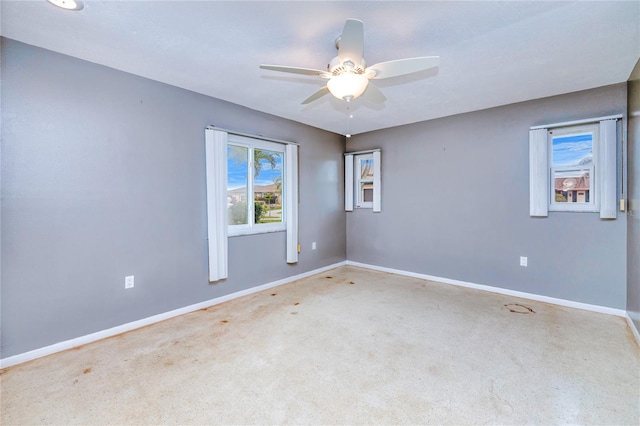 unfurnished room featuring ceiling fan