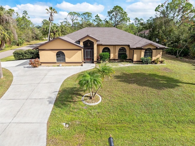 1160 Rizzo St, Port Charlotte, FL 33952 - view of front facade with a front lawn