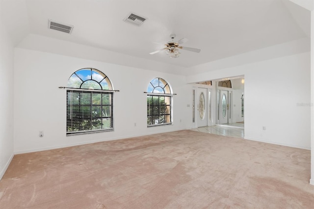 carpeted empty room with ceiling fan