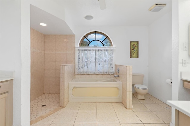 full bathroom with tile patterned floors, vanity, independent shower and bath, and toilet