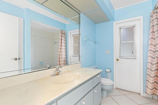 bathroom featuring tile patterned flooring, vanity, toilet, and a shower with shower curtain