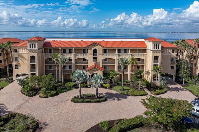 view of building exterior featuring a water view