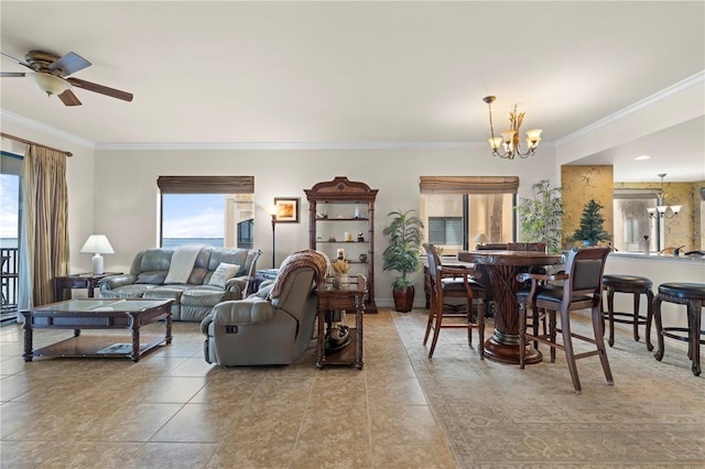 living room with light tile patterned floors, ceiling fan with notable chandelier, and crown molding