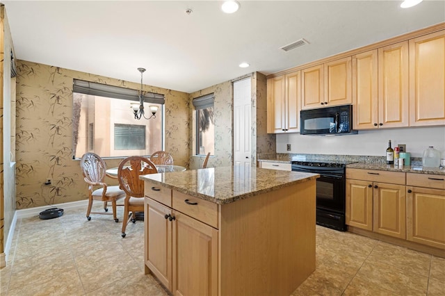 kitchen featuring a center island, an inviting chandelier, black appliances, hanging light fixtures, and light stone counters