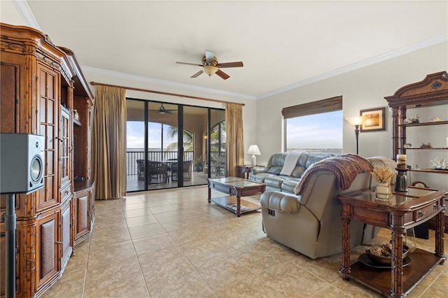 tiled living room with ceiling fan and crown molding