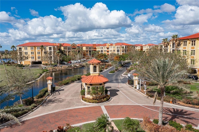 view of community with a water view