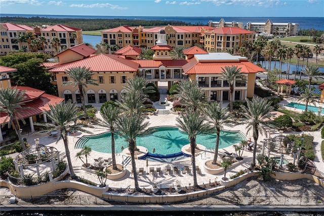 drone / aerial view featuring a water view