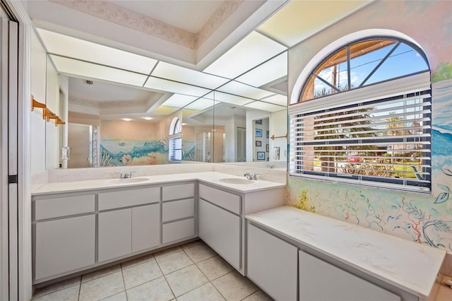 bathroom with tile patterned flooring and vanity