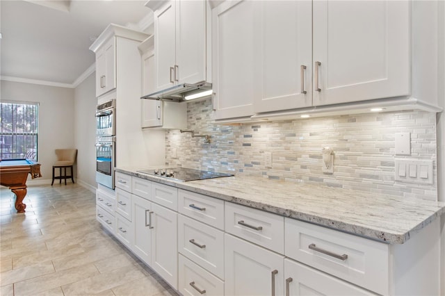 kitchen with white cabinets, black electric cooktop, crown molding, and pool table