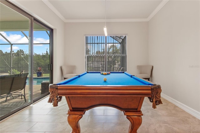 playroom with a wealth of natural light, crown molding, and billiards