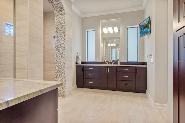 bathroom with vanity and ornamental molding