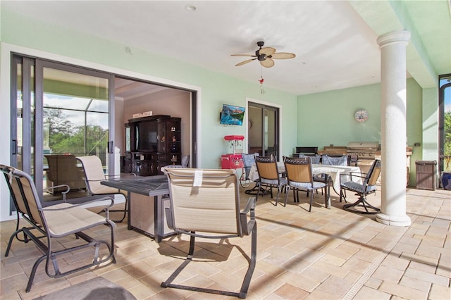 view of patio / terrace featuring ceiling fan, a lanai, and grilling area