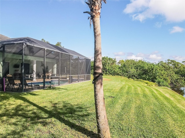 view of yard featuring a lanai