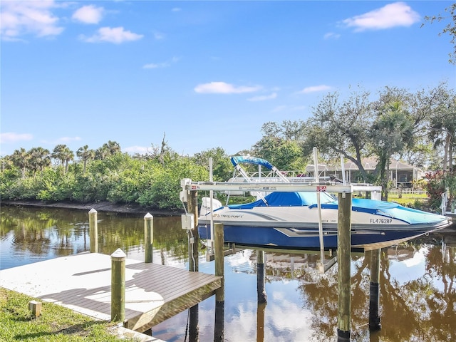 view of dock with a water view