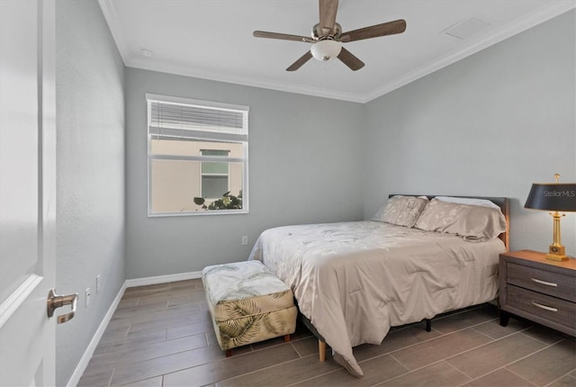 bedroom featuring ceiling fan and crown molding