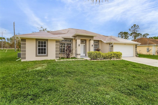 view of front of home with a garage, a front lawn, and central air condition unit