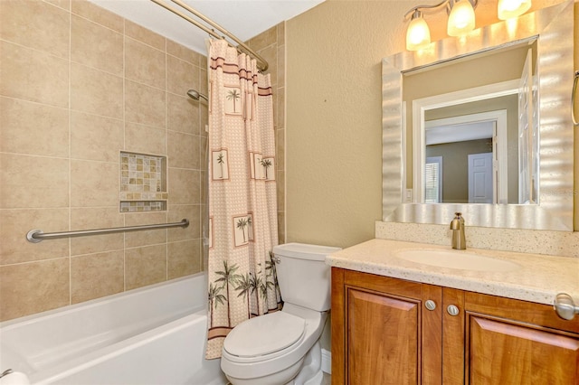 full bathroom with vanity, toilet, and shower / bath combo with shower curtain