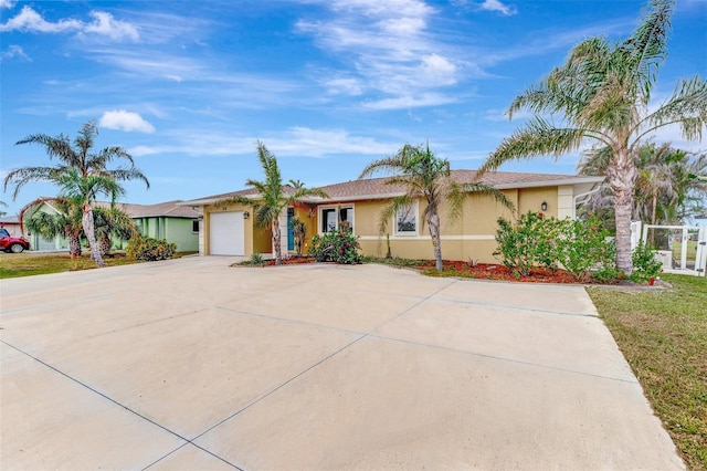 ranch-style house featuring a garage