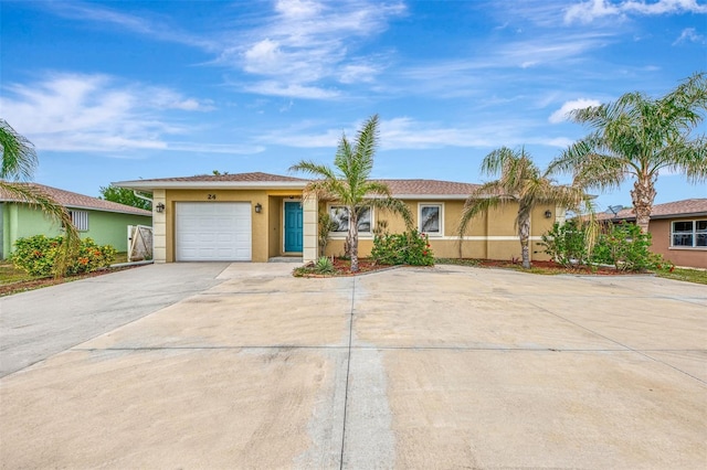 single story home with a garage