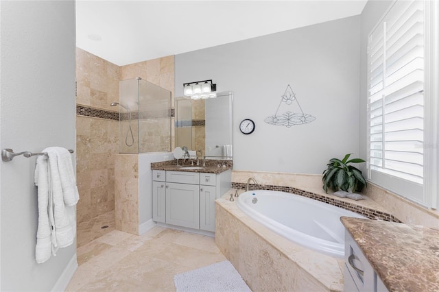 bathroom with shower with separate bathtub and vanity