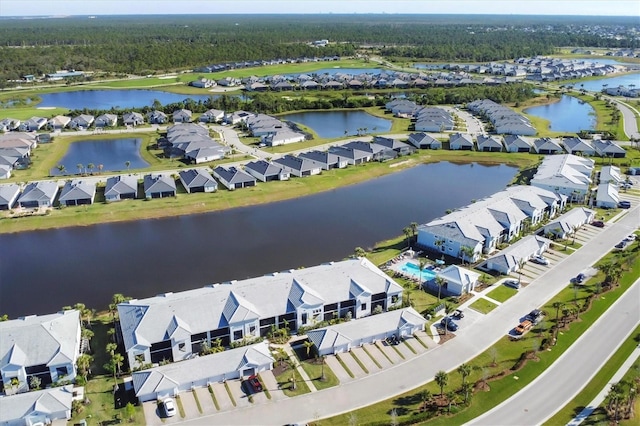 drone / aerial view with a water view