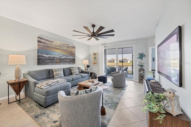 living room with light tile patterned floors and ceiling fan