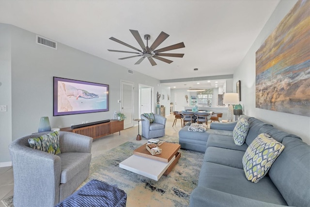 living room with light tile patterned floors